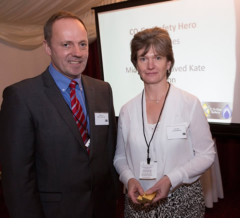 Mark Oliver of Wales & West Utilities with Trish Hines, midwife.